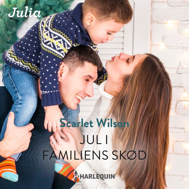 Book cover for Jul i familiens skød