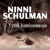 Tyttö lumisateessa