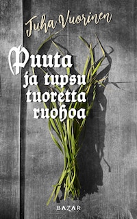 Puuta ja tupsu tuoretta ruohoa